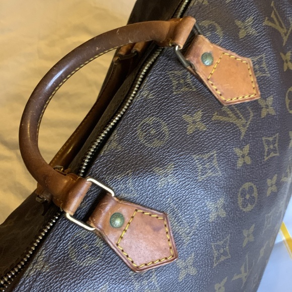 Authenticated Louis Vuitton Monogram Canvas with COA and lock and key #317 - Picture 13 of 16